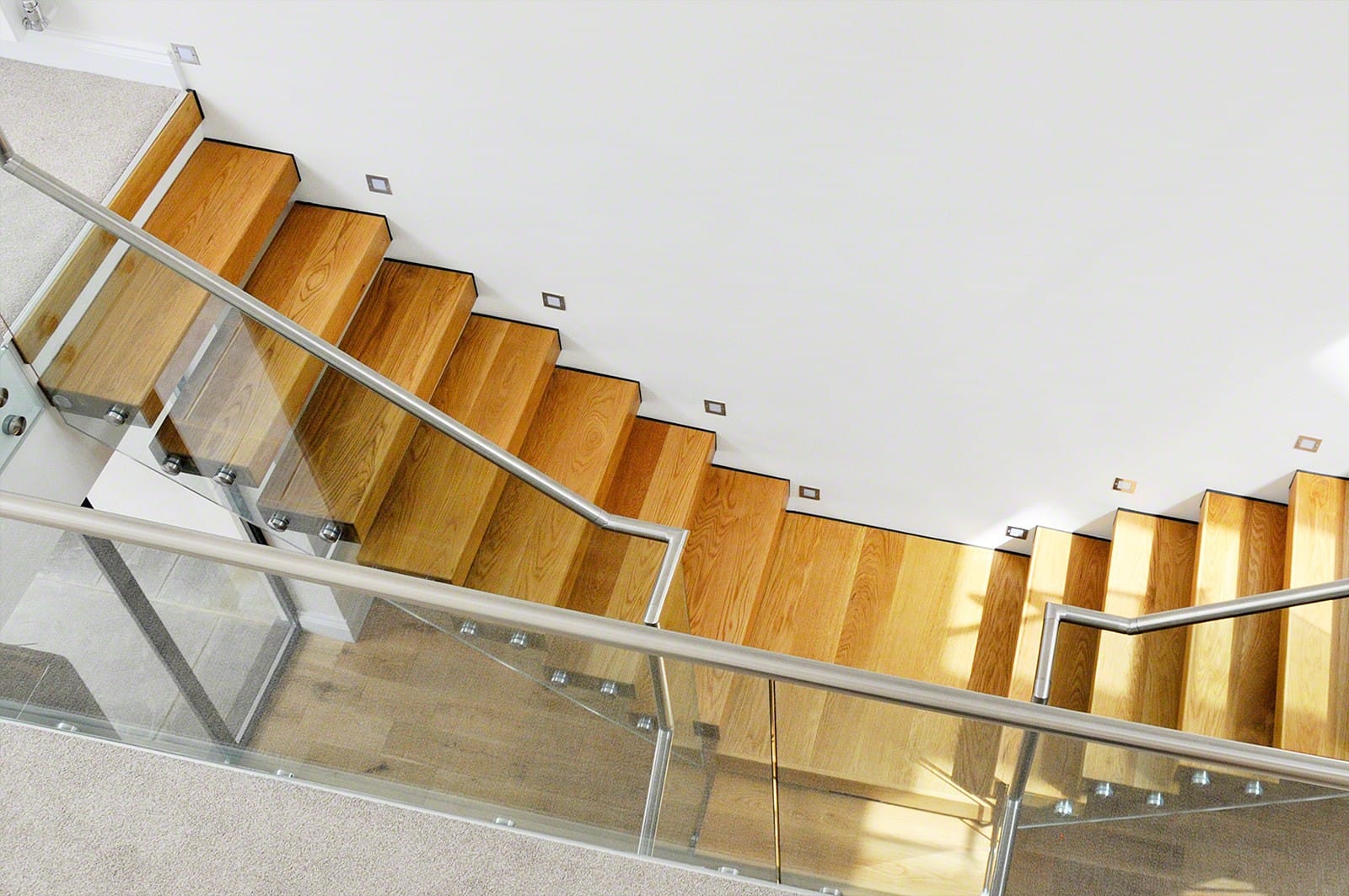Sklenené zábradlie schodiska kotvené na terčoch | DOMO GLASS